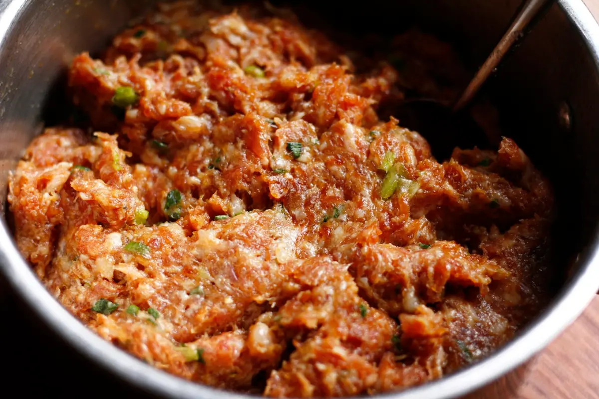 Preparing dipping sauce for Bun Cha