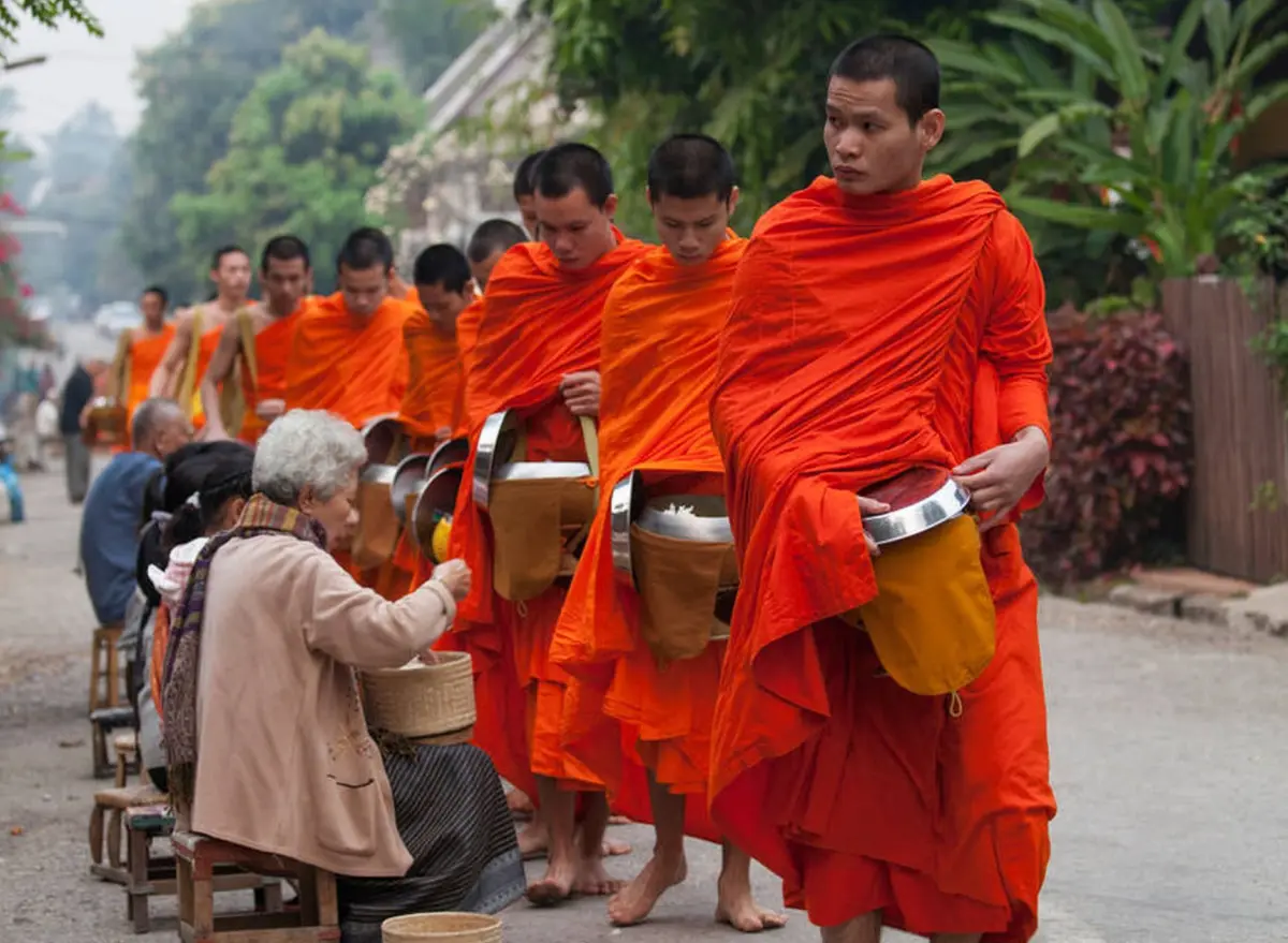 Monks collecting alms in Luang Prabang at dawn