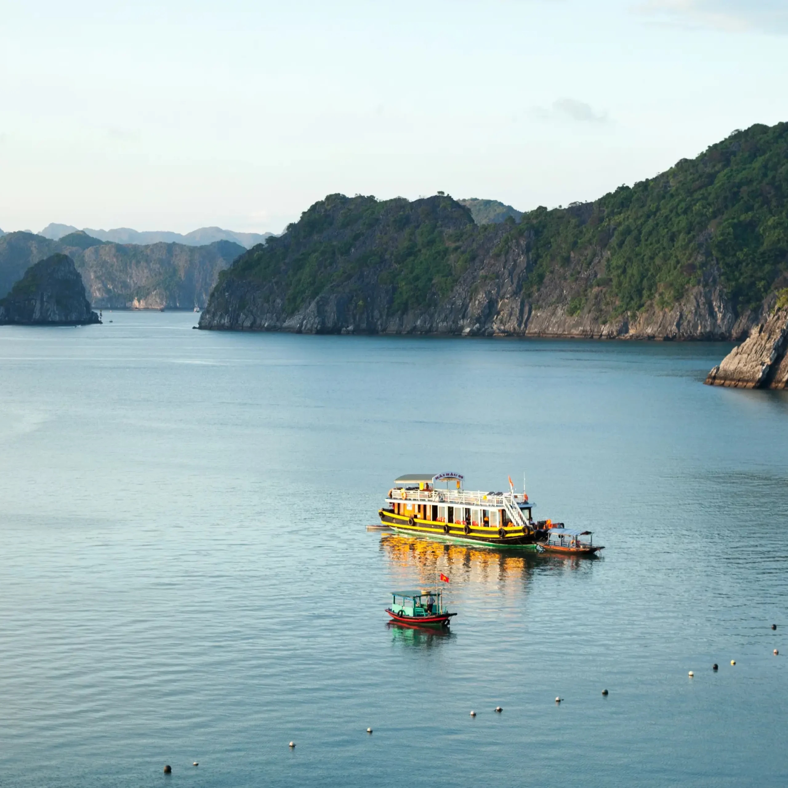 Lan Ha Bay limestone karsts rising from turquoise water